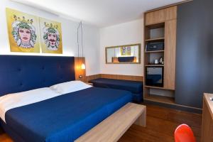 Posteľ alebo postele v izbe v ubytovaní Colleverde Park Hotel