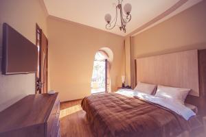 Postel nebo postele na pokoji v ubytování Royal Venezia Hotel
