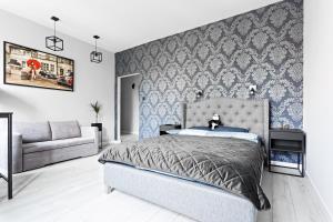 Posteľ alebo postele v izbe v ubytovaní Quiet Apartment Koscielna Old Town