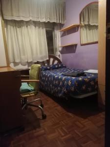 Giường trong phòng chung tại HAB room 1 WIFI Vista Alegre