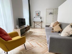 Televízia a/alebo spoločenská miestnosť v ubytovaní Venus Apartments - King Street IV