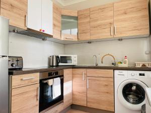 A cozinha ou cozinha compacta de Be like your home.