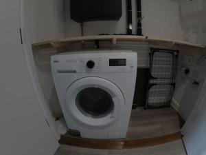 a washer and dryer in a small room at RM13 x Weekly x Monthly Offers DM in Dagenham