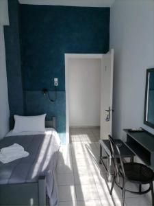 Voodi või voodid majutusasutuse Hotel Theoxenia toas