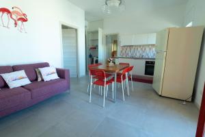 A kitchen or kitchenette at Appartamenti Craulo