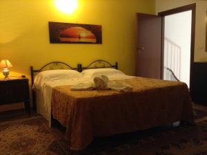 A bed or beds in a room at Villa Orizzonte