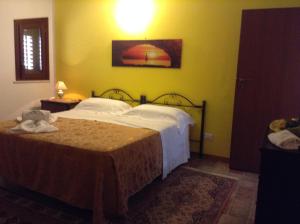 A bed or beds in a room at Villa Orizzonte