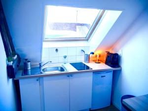 Kuchyň nebo kuchyňský kout v ubytování Serenity Home + 7 fotografií