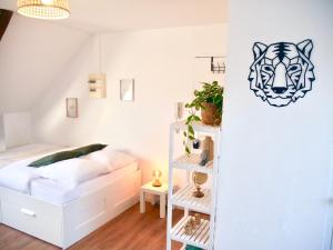 Postel nebo postele na pokoji v ubytování Serenity Home