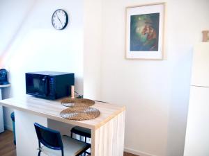 TV a/nebo společenská místnost v ubytování Serenity Home