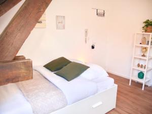 Postel nebo postele na pokoji v ubytování Serenity Home