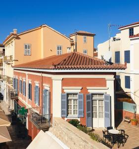a view of a row of houses on a street at Xenon Inn in Nafplio