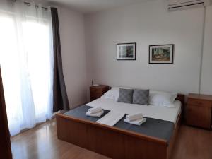 Postel nebo postele na pokoji v ubytování Kresho