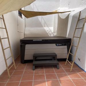 A bed or beds in a room at Terra Aloé