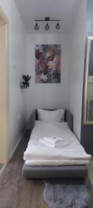 Postel nebo postele na pokoji v ubytování APARTMAN POZORISTE Penthaus