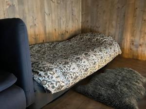 Postel nebo postele na pokoji v ubytování Attraktiv & smart funkishytte på Nes Strandhager.
