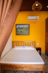 Katil atau katil-katil dalam bilik di Trú Homestay Huế