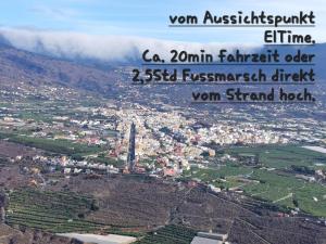 a view of a city from the top of a mountain at casa Christina in Puerto de Tazacorte