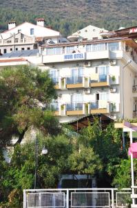 a hotel on the side of a hill at Nur Hotel in Kaş