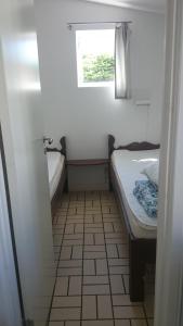Cama o camas de una habitación en Mulde Gård