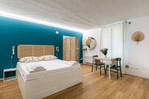 A bed or beds in a room at Casa Pratello