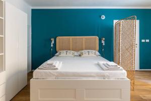 A bed or beds in a room at Casa Pratello