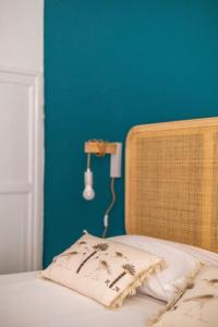 A bed or beds in a room at Casa Pratello