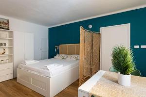 A bed or beds in a room at Casa Pratello