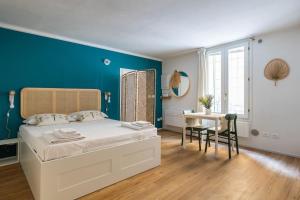 A bed or beds in a room at Casa Pratello