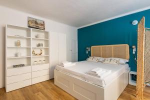 A bed or beds in a room at Casa Pratello