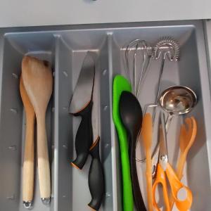 a drawer filled with different types of utensils at Ruby studio 5min to Vantaa Airport and 20min to Helsinki center in Vantaa