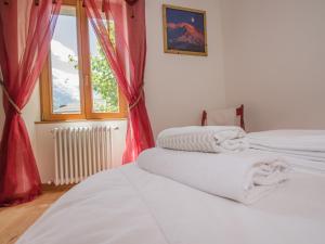Łóżko lub łóżka w pokoju w obiekcie Appartement central à Chamonix proche pistes avec balcon et WiFi - FR-1-343-194