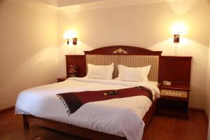 럭스 리버사이드 호텔 & 아파트 객실 침대