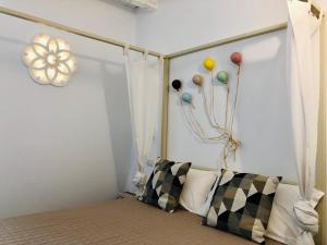 Postel nebo postele na pokoji v ubytování Atipico B&B