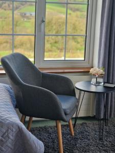 Ein Sitzbereich in der Unterkunft Cable Island Bed and Breakfast