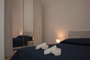 Voodi või voodid majutusasutuse Casa Morrone Residence toas