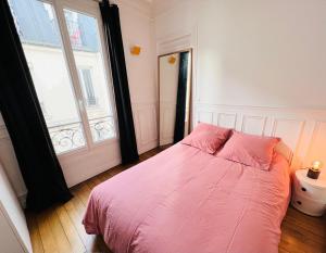 Fotografia z galérie ubytovania Charmant appartement entre Montmartre et canal Saint Martin-gare du nord v Paríži