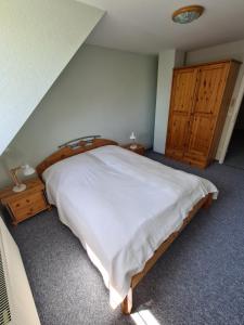 Postel nebo postele na pokoji v ubytování Sonnenhus 1 - BreegeRügen
