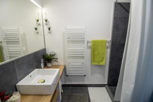 Koupelna v ubytování Rooms BAUMAN