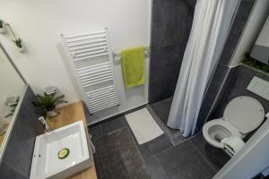 Koupelna v ubytování Rooms BAUMAN