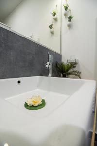 Koupelna v ubytování Rooms BAUMAN