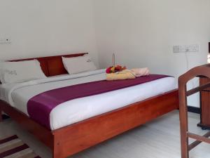 Postel nebo postele na pokoji v ubytování Subash Hotel
