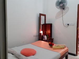 Postel nebo postele na pokoji v ubytování Subash Hotel