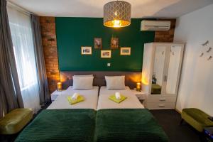 Postel nebo postele na pokoji v ubytování Rooms BAUMAN