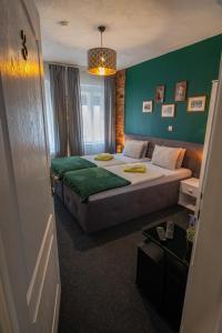 Postel nebo postele na pokoji v ubytování Rooms BAUMAN