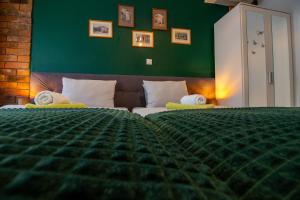 Postel nebo postele na pokoji v ubytování Rooms BAUMAN