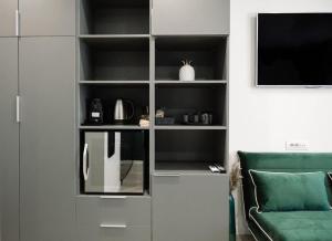 A kitchen or kitchenette at Salotto Room Boutique Pescara