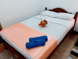 Postel nebo postele na pokoji v ubytování Subash Hotel