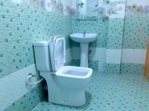 Koupelna v ubytování Subash Hotel