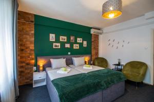 Postel nebo postele na pokoji v ubytování Rooms BAUMAN